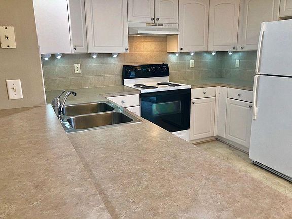 Kitchen with a concrete-looking surface