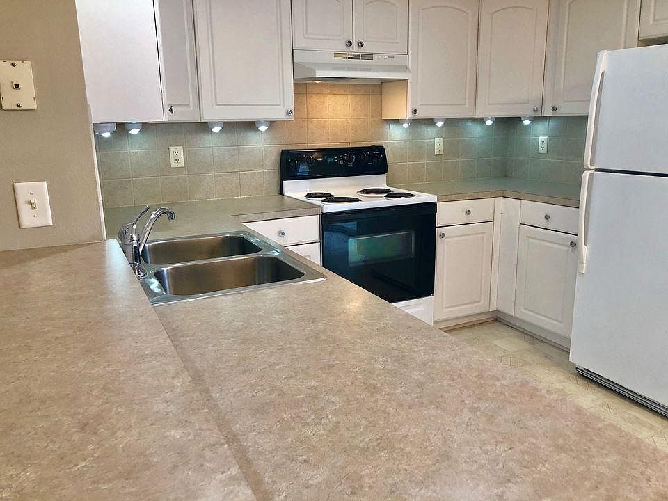 Kitchen with a concrete-looking surface