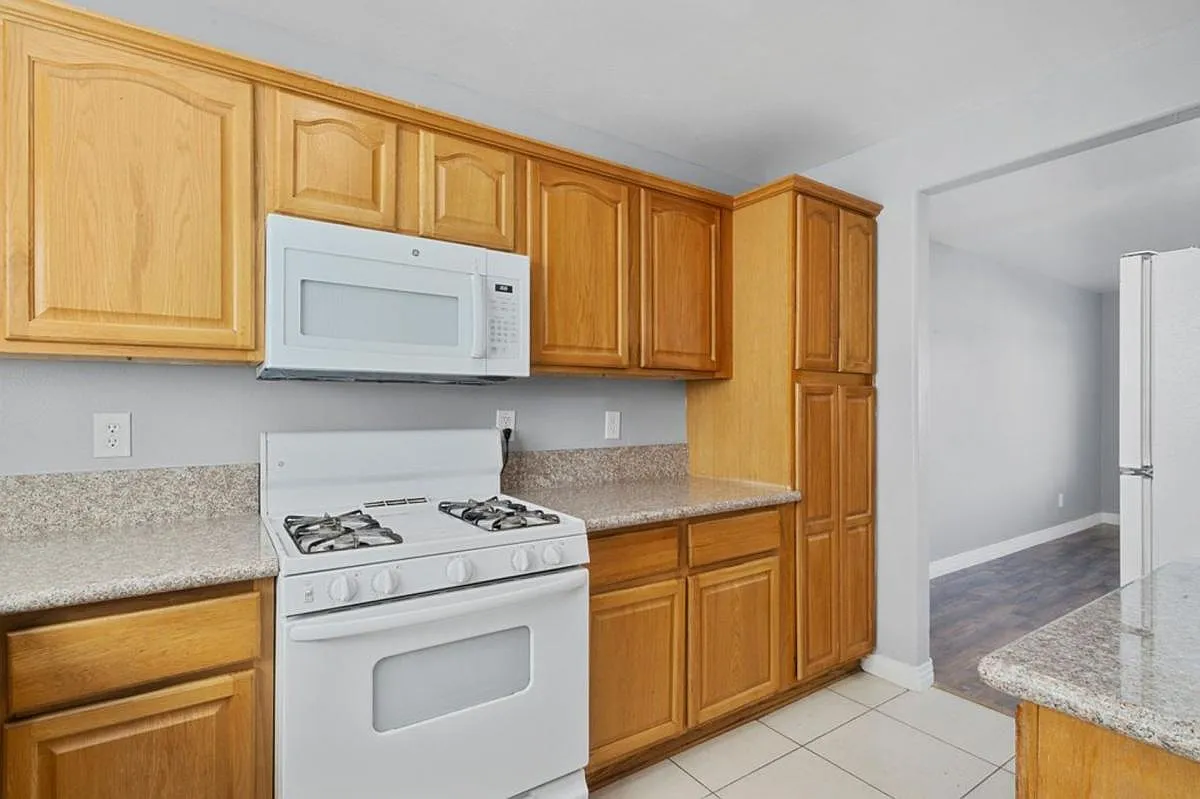 Large Renovated 3-Bed/2.5-Bath Townhomes at a Great Price with Covered Parking Included — Photo 3
