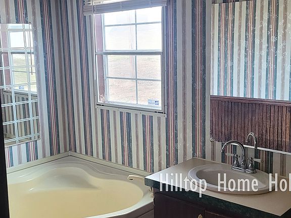 Ensuite bathroom has a garden tub
