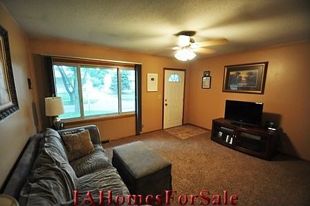 Living Room - Upstairs living room is wired for surround sound. Large picture window for lots of nat
