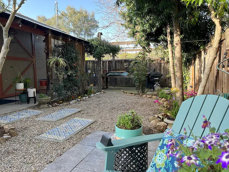 Backyard with workshop area in rear