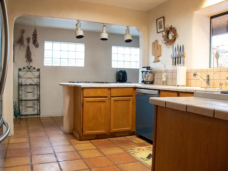 Kitchen with new Samsung fridge and new dishwasher.