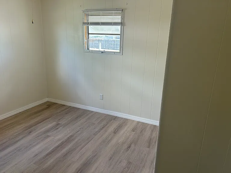 Master bedroom. Left wall as a double window.