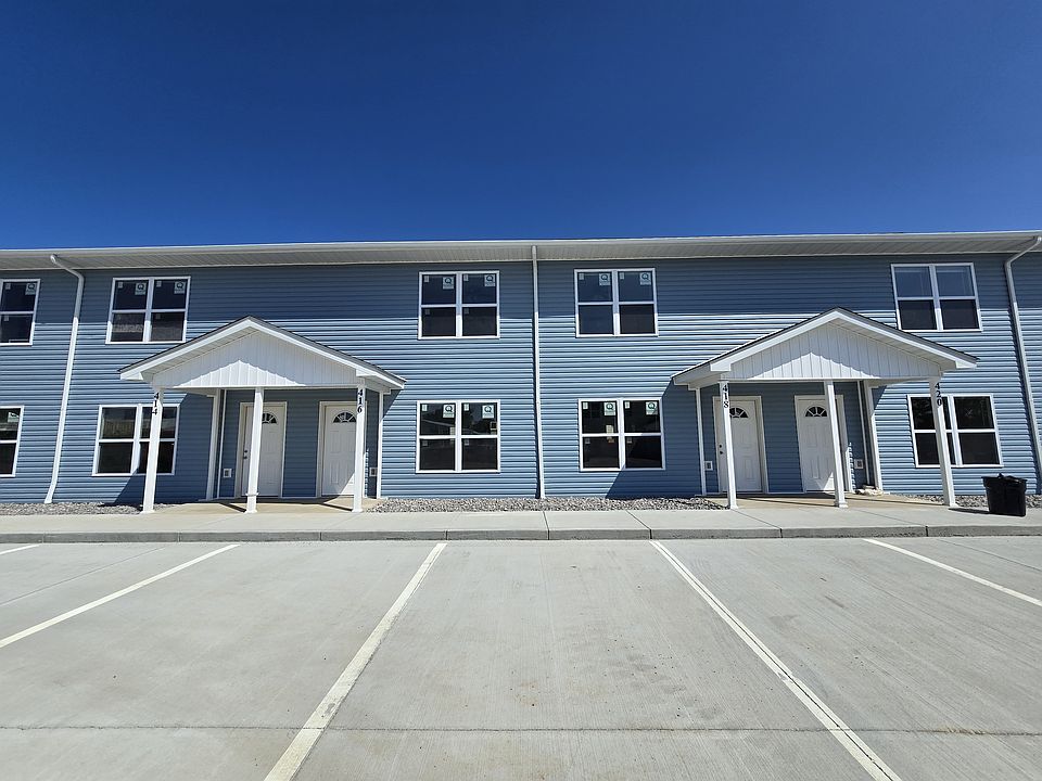 Exterior front of townhome building.