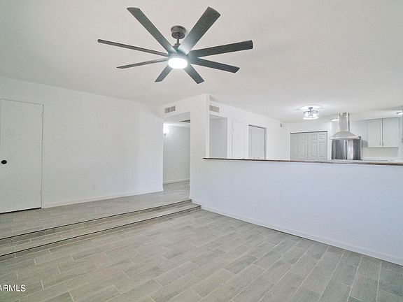 5th image of 6047 W CRITTENDEN Lane