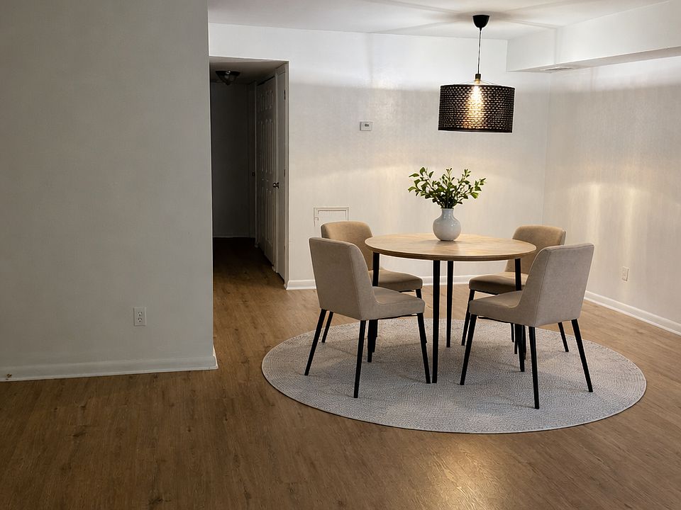 Dedicated dining area with modern lighting, perfect for everyday meals or entertaining guests.
"AI Staging Prompt"