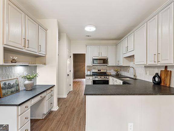 4th image of 5500 Arrowind Rd NW