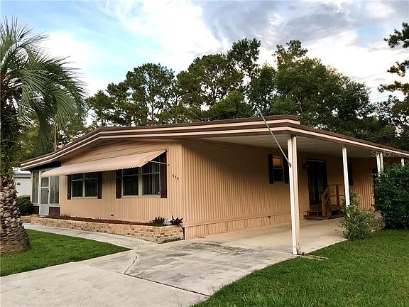 Front View...two cars can fit under carport