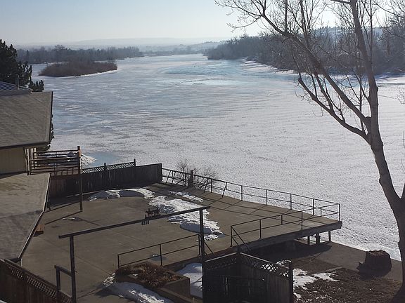 winter river photo from above house
