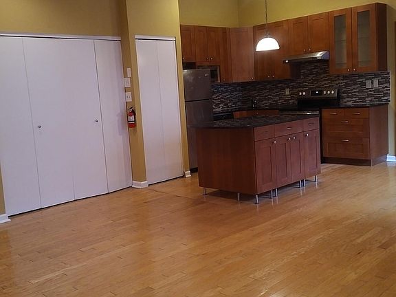 Open Floor Plan with Kitchen that opens to living & dining room area