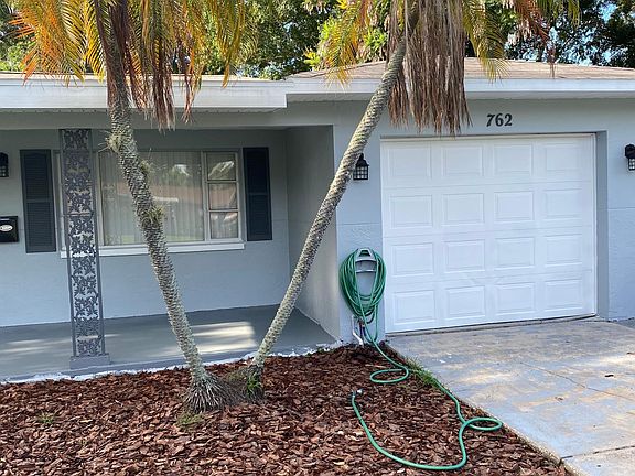 Single car garage with extra wide driveway