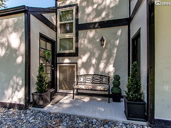 Side view of home with access to the park space