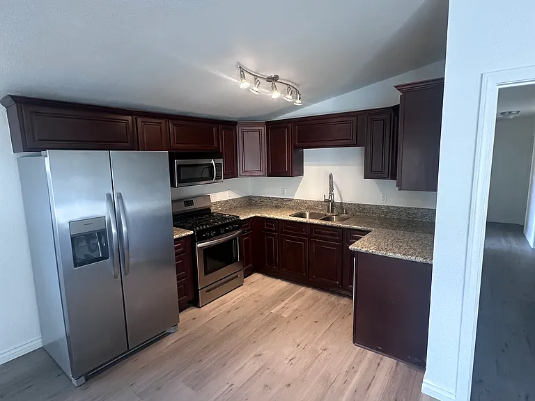 6071 Howell Dr — Photo 3