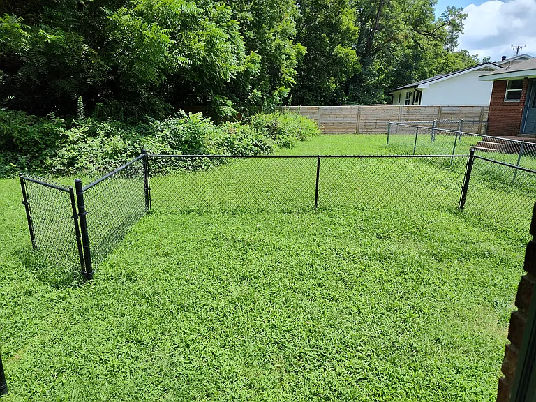 Private fenced in backyard