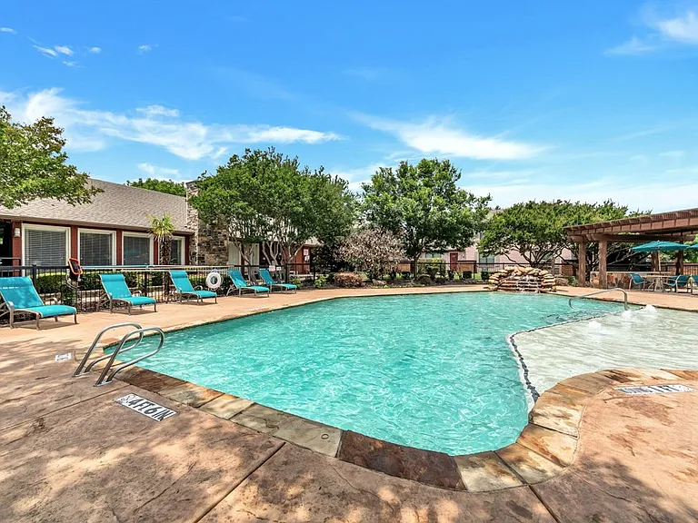 2nd community pool with surrounding lounge space for relaxation and recreation.