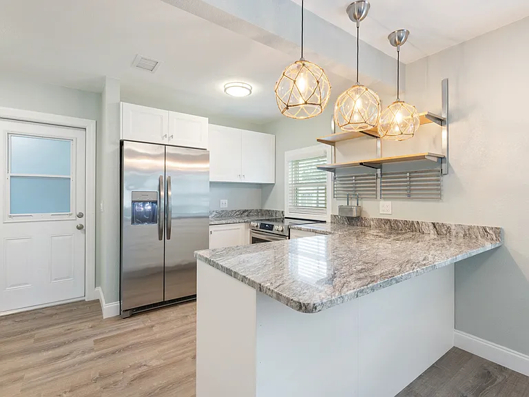 Thoughtfully Updated Finishes
From the durable luxury vinyl plank flooring to the soft-close cabinetry and designer finishes, every detail of this kitchen has been upgraded for a clean, cohesive, and contemporary feel.