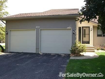 Outside
						:
						End Unit with Double Garage.
