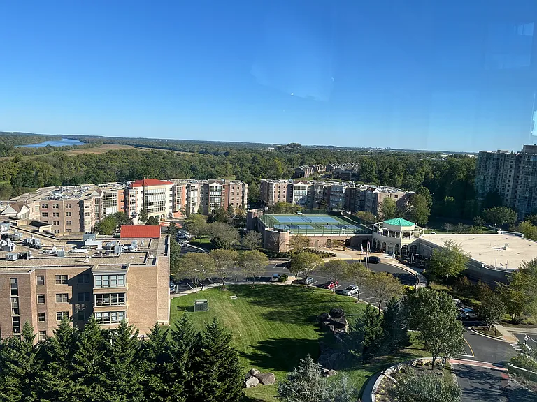 View of LWVA low-rise condos, clubhouse, and Potomac River beyond
