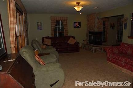 Living Room with 3 sided fireplace