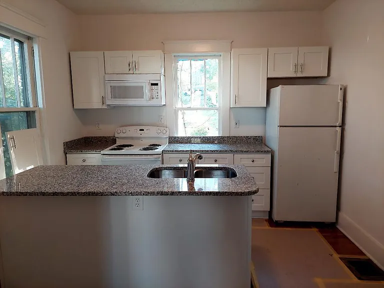 Recent new cabinets and granite, microwave, stove, dishwasher, fridge