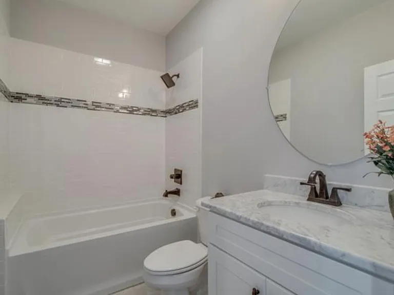 downstairs bathroom, next to laundry room