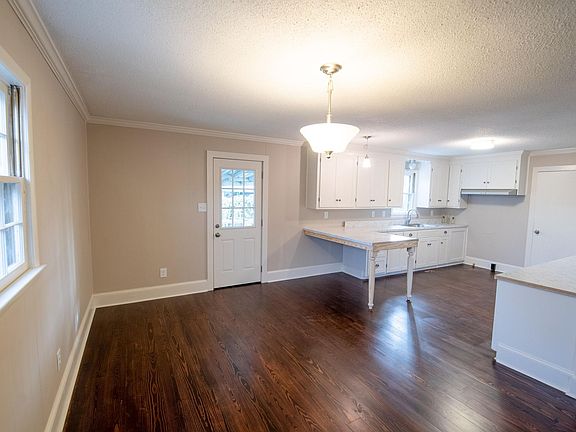 Dining room and kitchen.