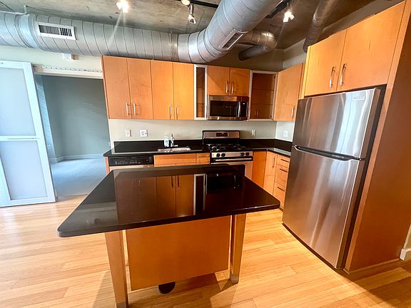 Chief's kitchen with gas range and island