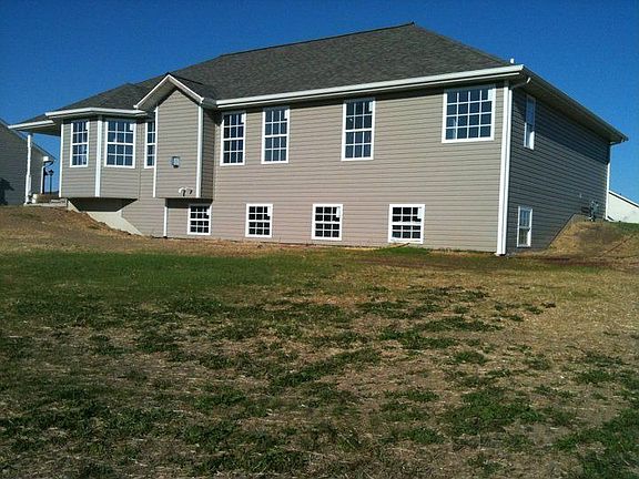 surrounded with siding and lots of windows 