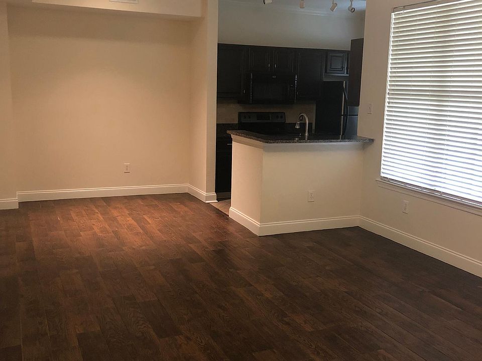 Living Room Looking Into Dining and Kitchen