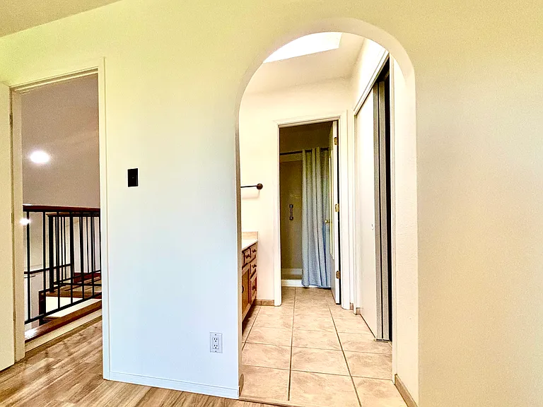Suite D- Entry into en suite bathroom and walk-in closet