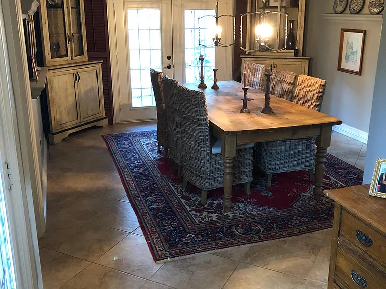 View from Front Door of Dining Room and Side Entrance. Maste