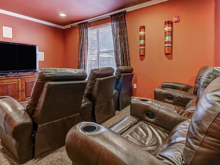 Theater Room with TV and recliners