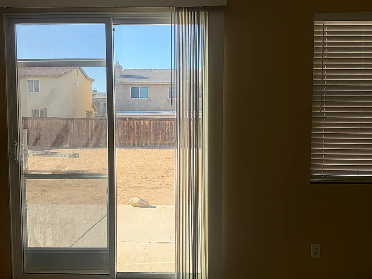 Slide door to the backyard