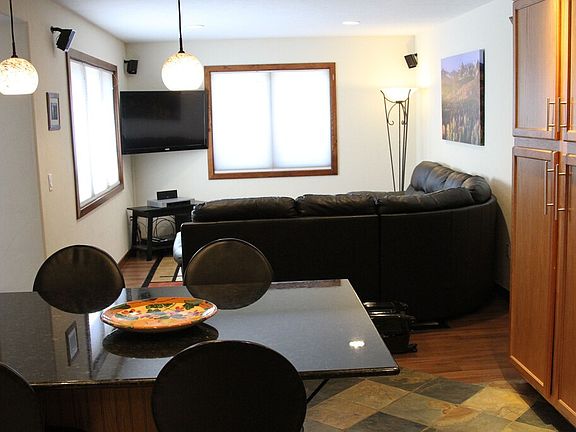 Granite kitchen table and living room.