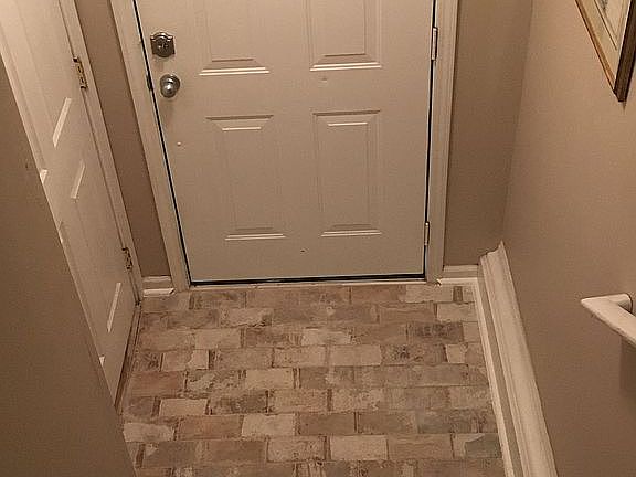 Brick tiled foyer