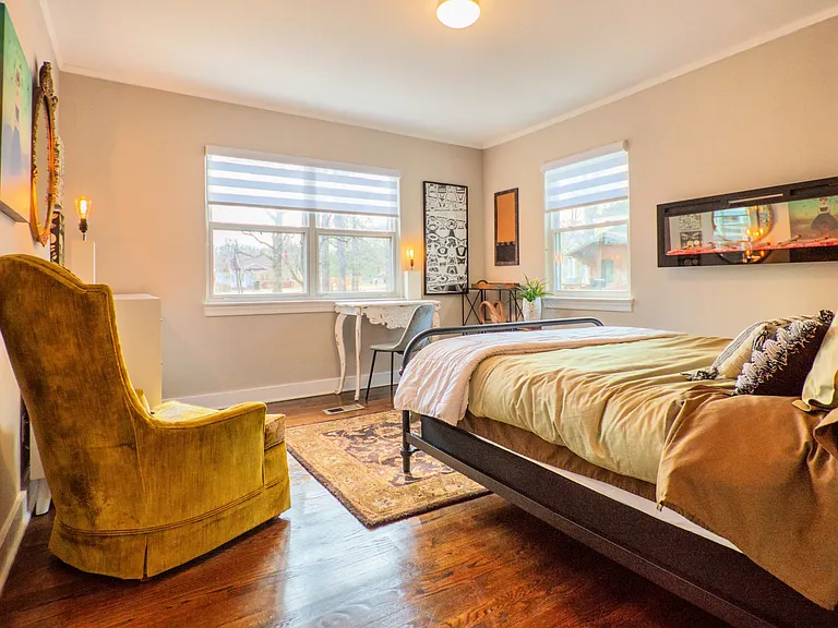 Modern & artsy bedroom #3, queen sized bed & electric fireplace for extra warmth or just ambiance!