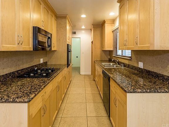 Updated cabinets and granite with eat-in breakfast