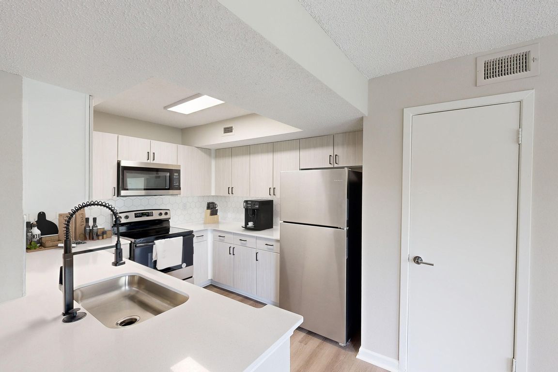 Newly Renovated Kitchen with Quartz Countertops