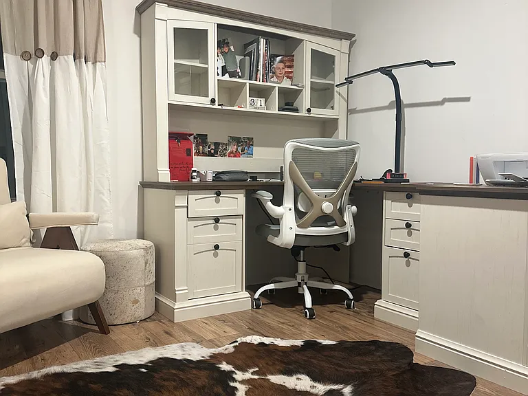 office and sofa bed.
Ergonomic work chair, office starting supplies and printer.