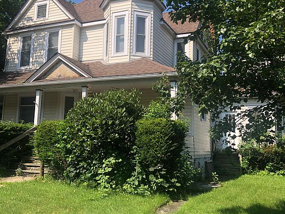 Side of house where side entrance to studio apartment is located