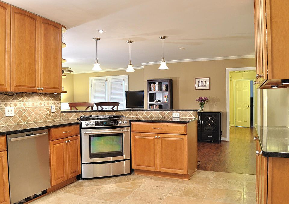 Kitchen opens to family room with room for a table.