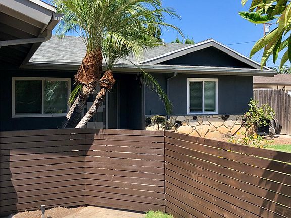 new gate that encloses the spacious front yard.