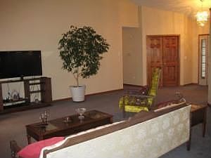 Living Room to Bedroom and Front Door