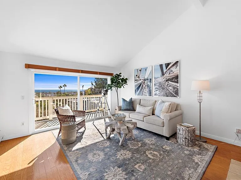 Living Room with view off upper deck