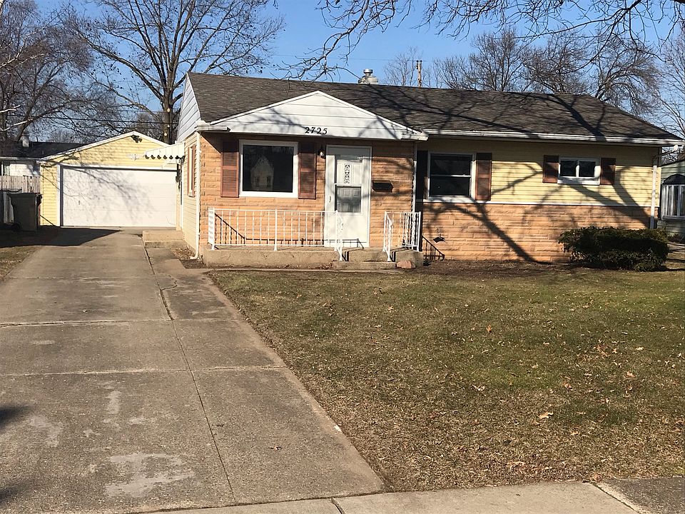 Large driveway and garage