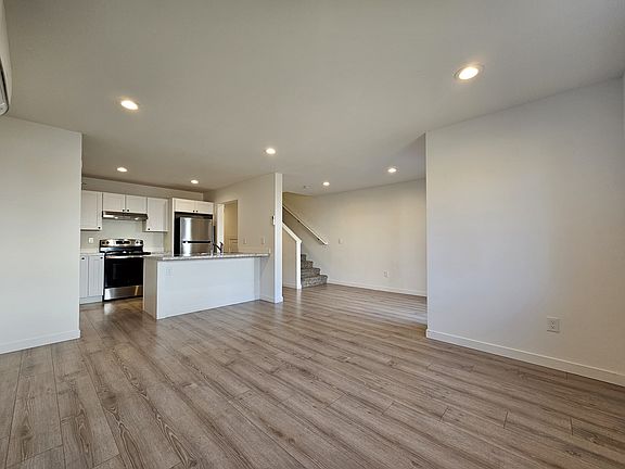 View of the living room and kitchen.