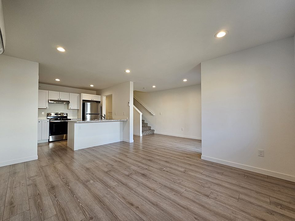 View of the living room and kitchen.