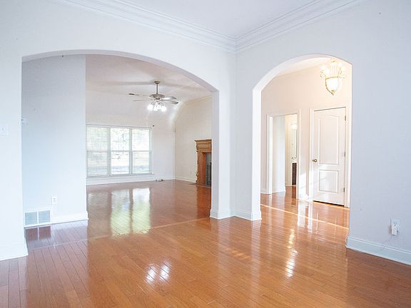 Great room/dining/hall with arches