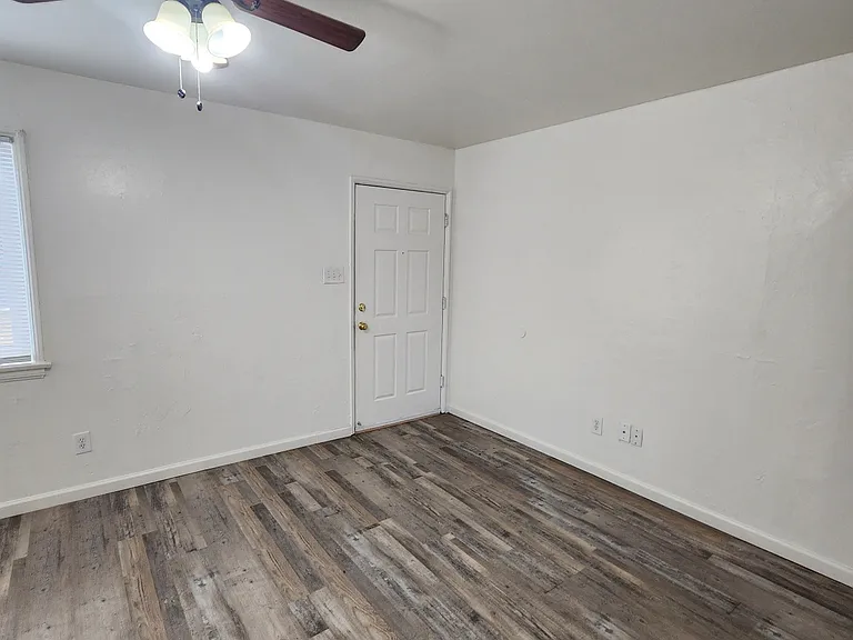 Living room - front door to porch.